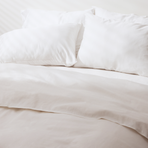 The White Duvet Cover Set in a bedroom scene 
